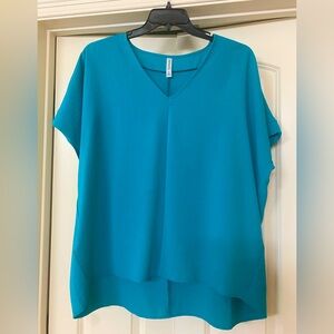 Women’s teal blouse